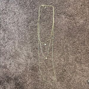 Elegant Gold Layered Necklace with hanging jewels